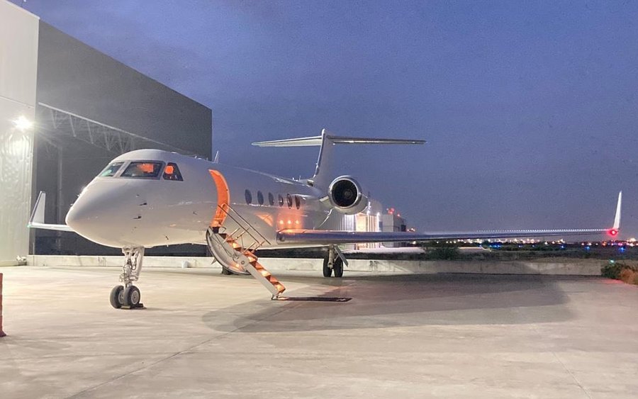 Private business jet at dusk